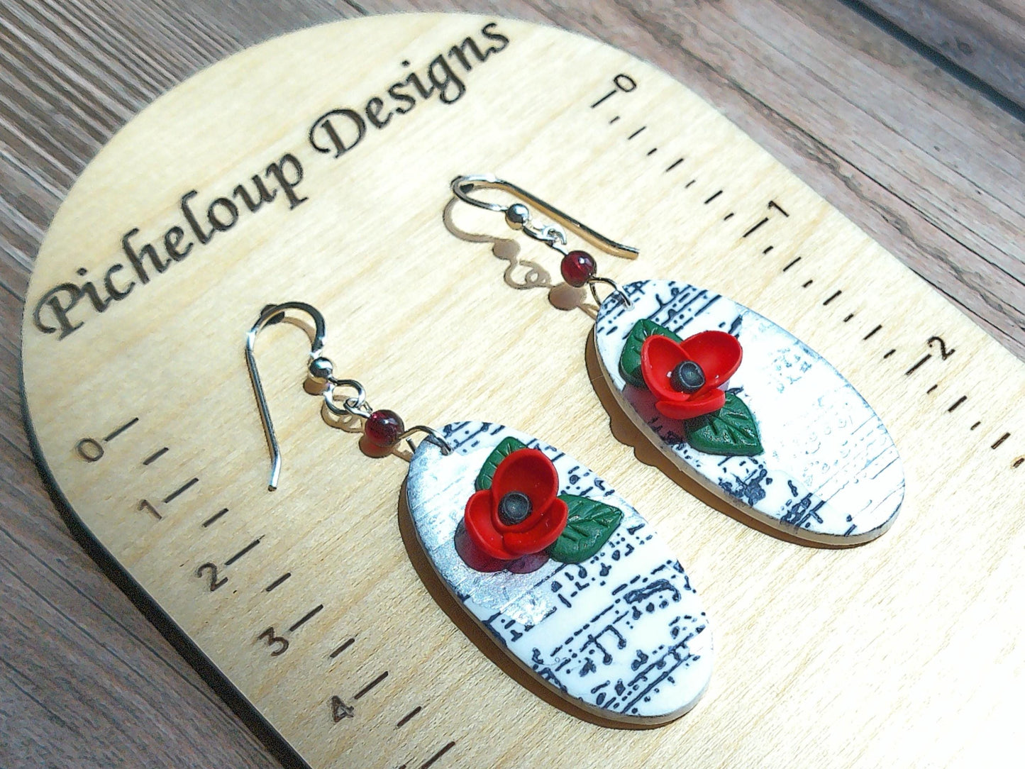 Sonata Earrings – Oval Polymer Clay Dangles with Garnet Accents & Music Note Design