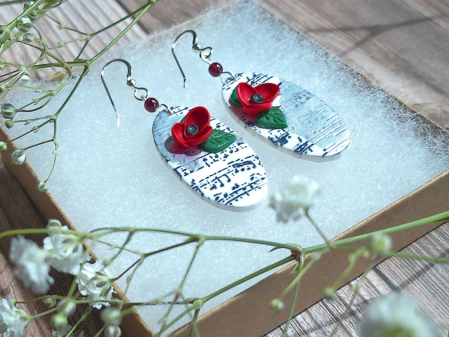 Sonata Earrings – Oval Polymer Clay Dangles with Garnet Accents & Music Note Design