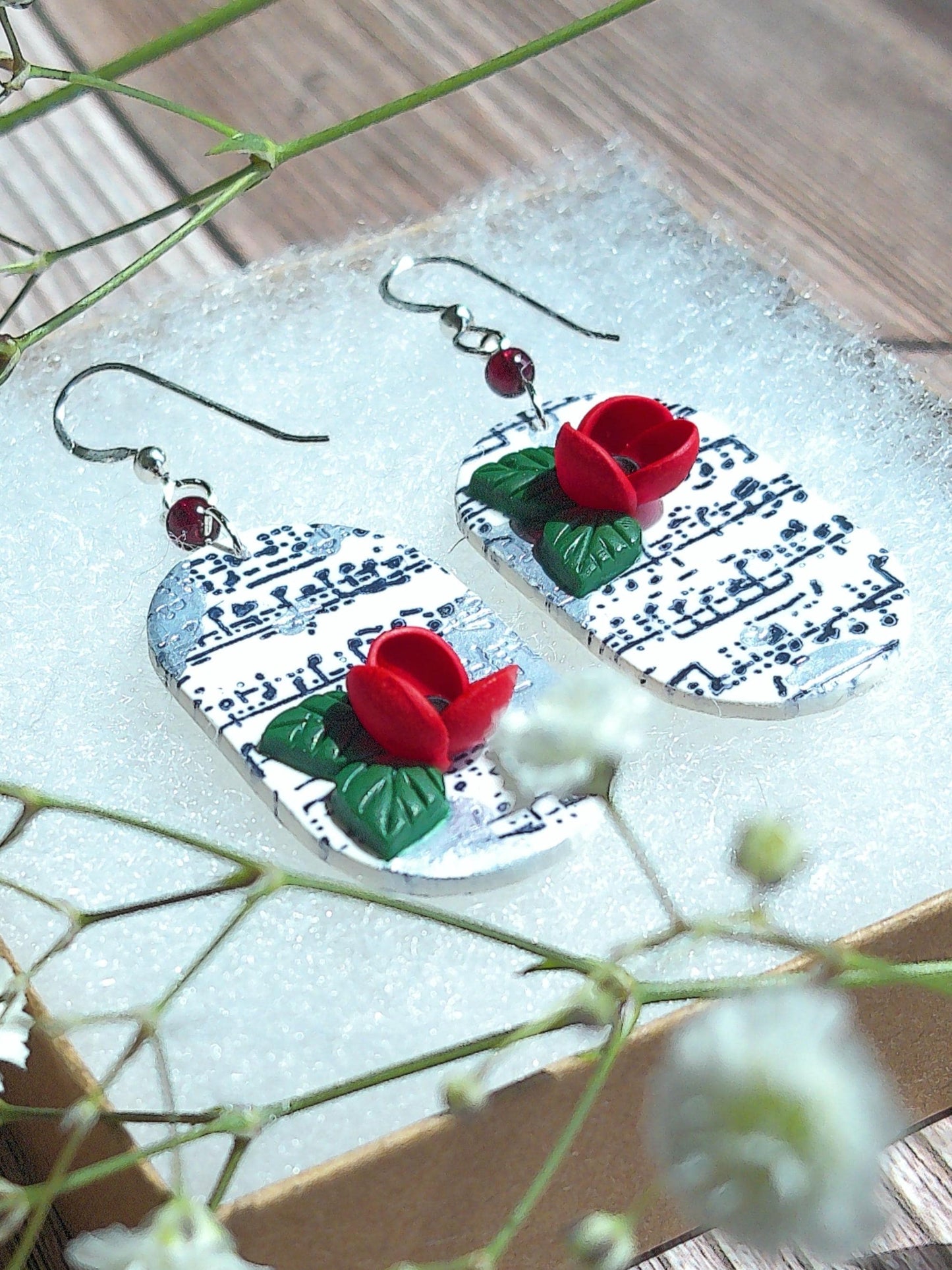 Cadence Earrings – Bold Oval Music Note Dangles with Garnet & Floral Accent