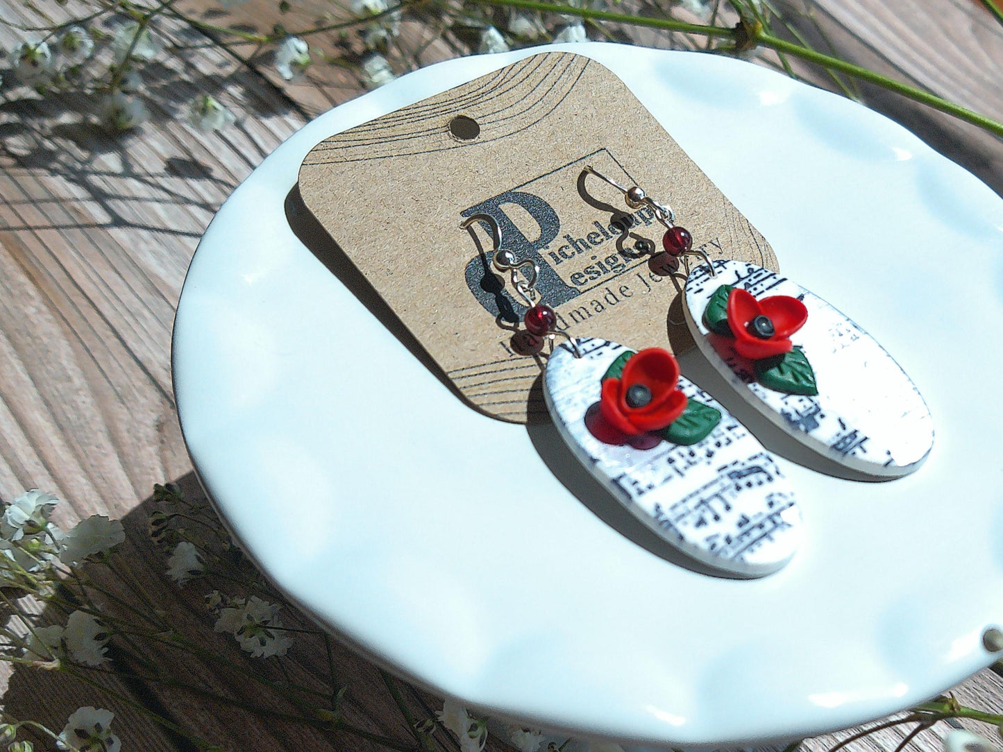 Sonata Earrings – Oval Polymer Clay Dangles with Garnet Accents & Music Note Design