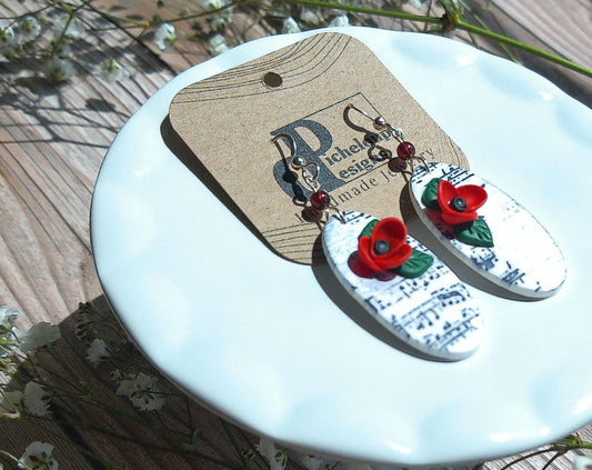 Sonata Earrings – Oval Polymer Clay Dangles with Garnet Accents & Music Note Design